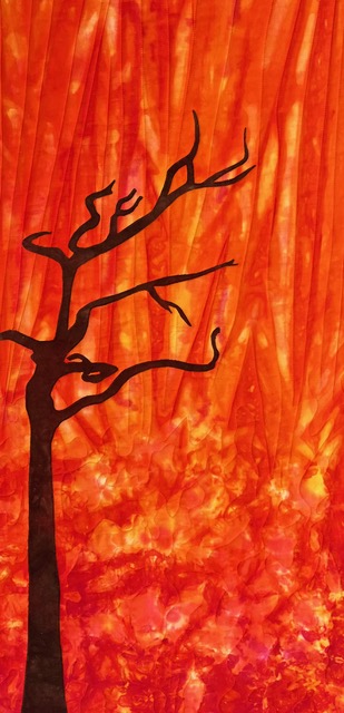 Tree silhouette textile art in autumn colours